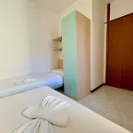 Апартаменти Frontemare 6 Posti Letto + Posto Auto Gratuito Бібіоне
